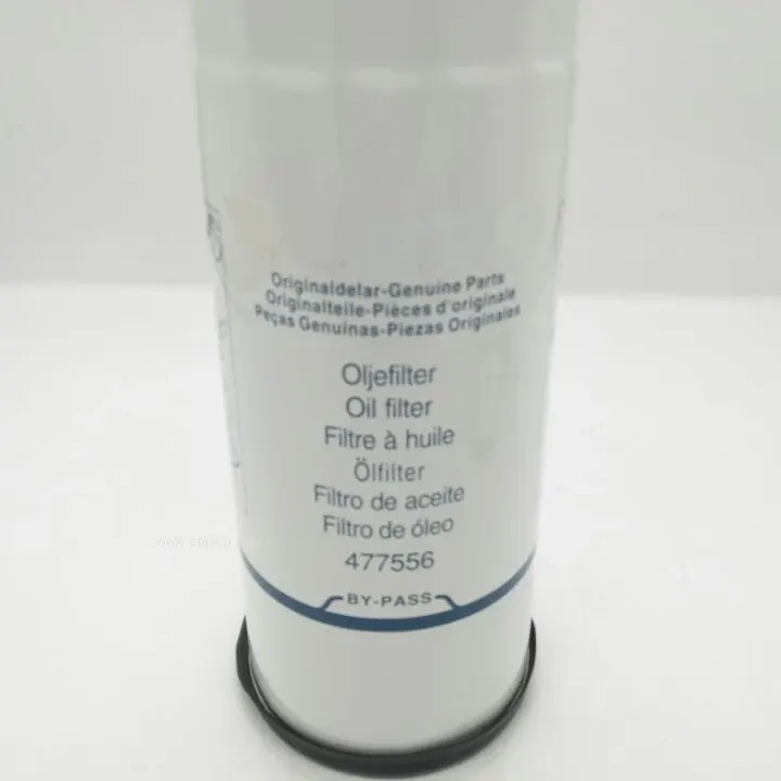 Black iron truck engine oil filter with OEM number 477556, side view with thread and sealing ring