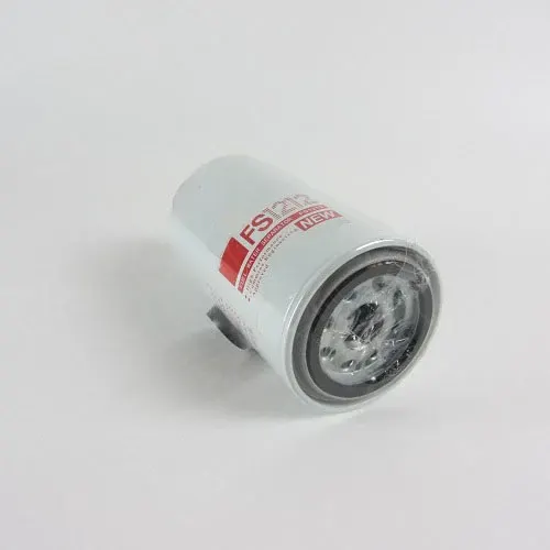 Black iron fuel water separator filter FS1212 mounted on a diesel engine fuel line