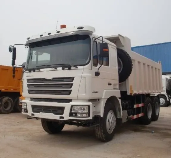 White Sinotruk HOWO 50T mining dump tipper parked on a yard, front three-quarter view