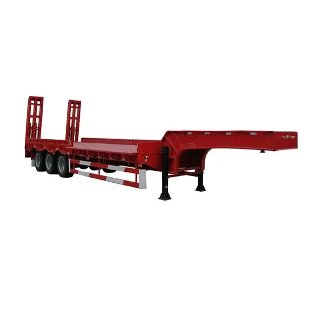 Side view of a tri-axle lowboy trailer with side extensions