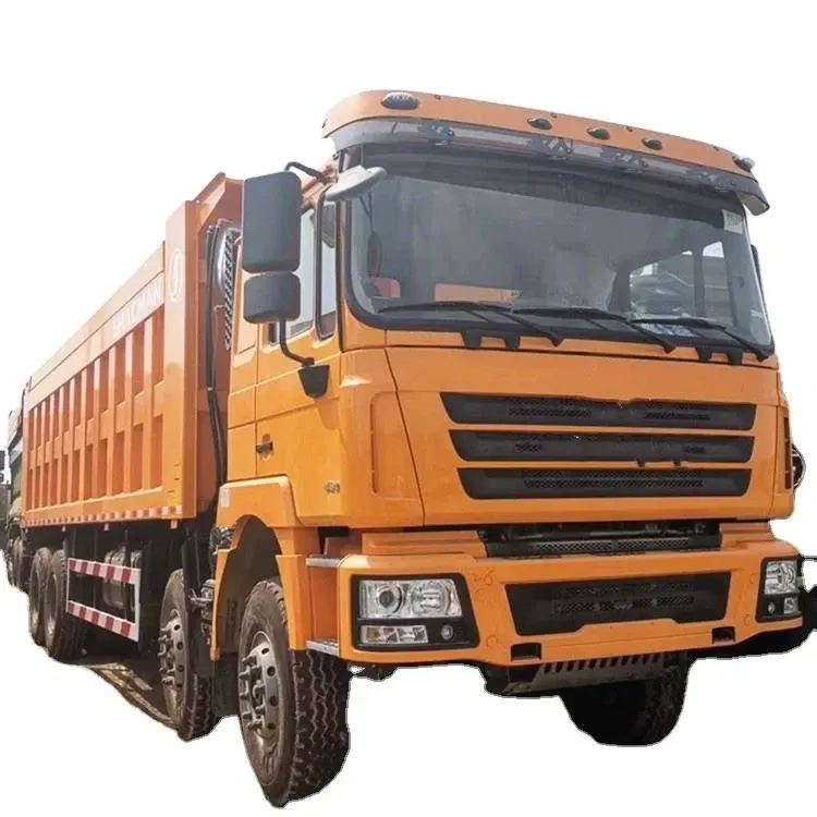 Front three-quarter view of a white HOWO 6x4 dump truck with 1200-24 tyres and air-conditioned cab