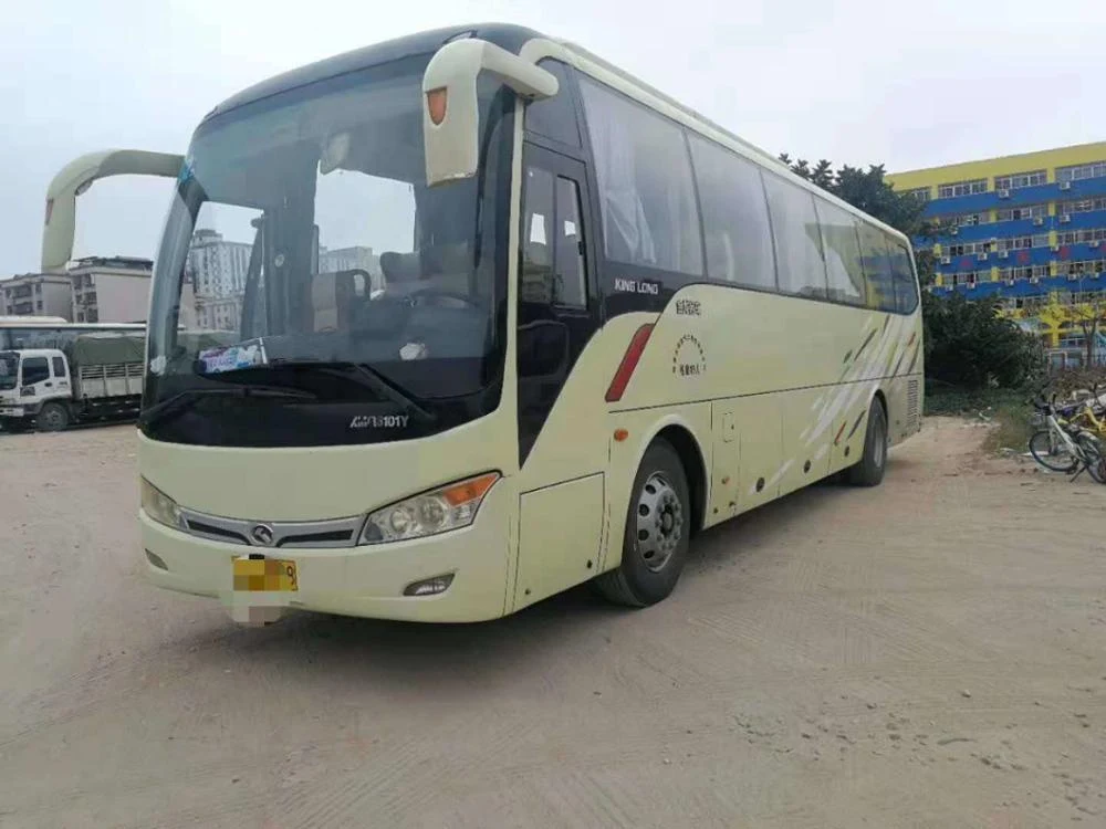 White 10-meter electric city bus parked on a yard, front three-quarter view
