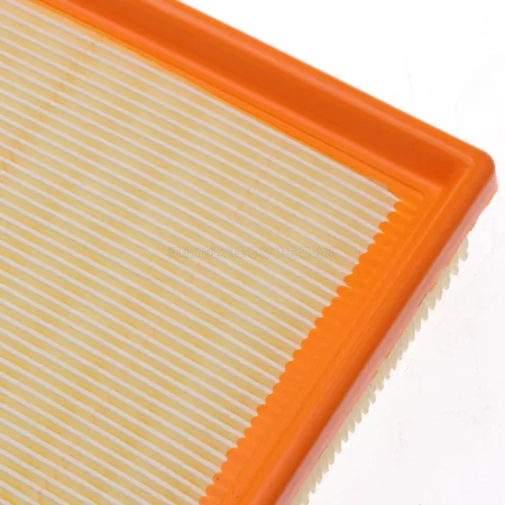 Close-up of the filter media and paper layer inside the housing