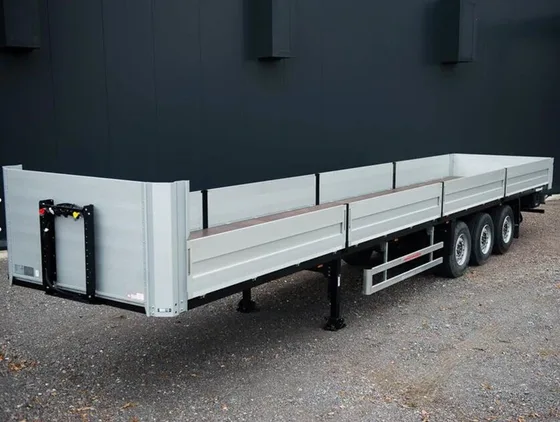 Side view showing the 13000mm length, 1200mm side walls, and 12.00R22.5 tyres on 9.0-22.5 rims