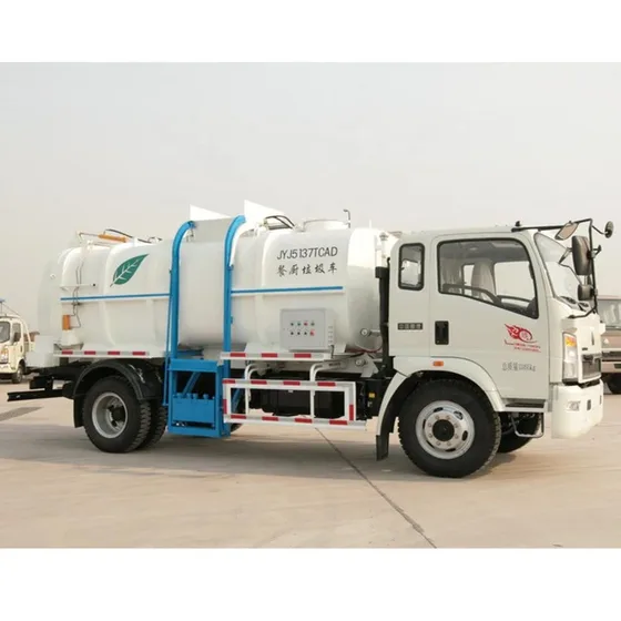 Rear view with hydraulic dump system and refuse hopper attachment