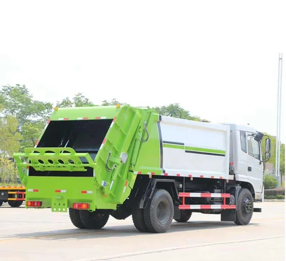 Front grille and headlamp detail of the HOWO garbage truck