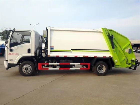 Side view of the truck with a standard waste container mounted on the hook lift