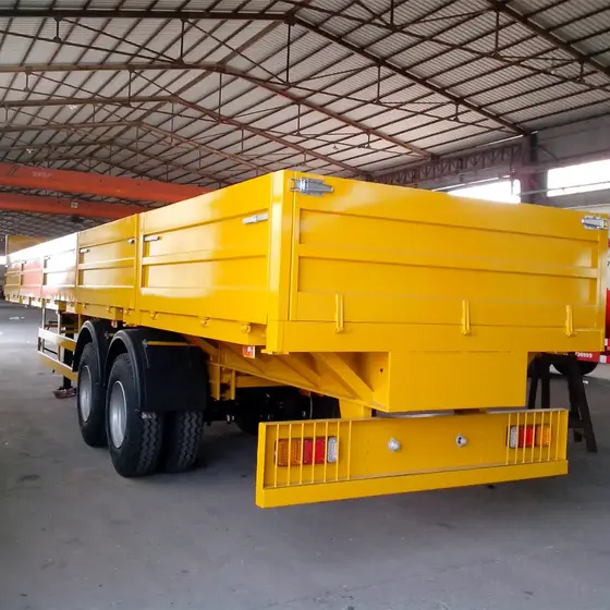 Side view of the semi-trailer showing the side walls and tyre details