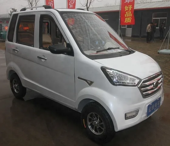 Side view of the electric car showing 1980mm wheelbase and 4.50-10 tubeless aluminum wheels