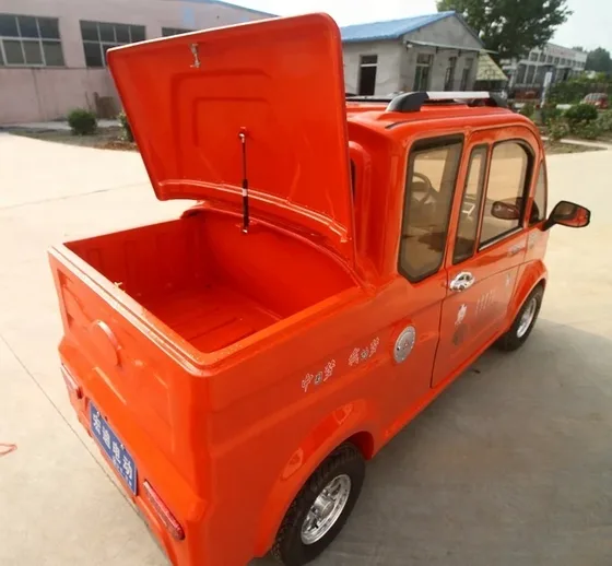 Rear view of the truck with cargo area and tailgate detail
