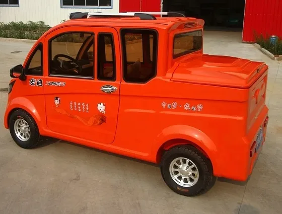 Interior view of the four-seater cabin with basic dashboard and steering wheel