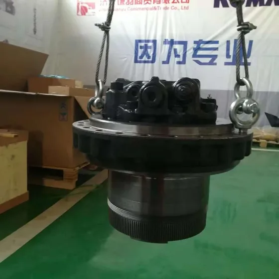 Side view of the final drive unit showing the hydraulic port and shaft output end