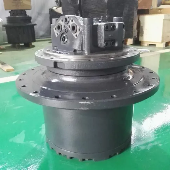 Side view of the final drive assembly with hydraulic connections and shaft output visible