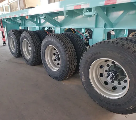 Rear view of the trailer with multiple axles and tires