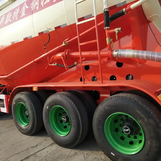 Rear view showing the 4'' discharge valve, air compressor, and landing gear
