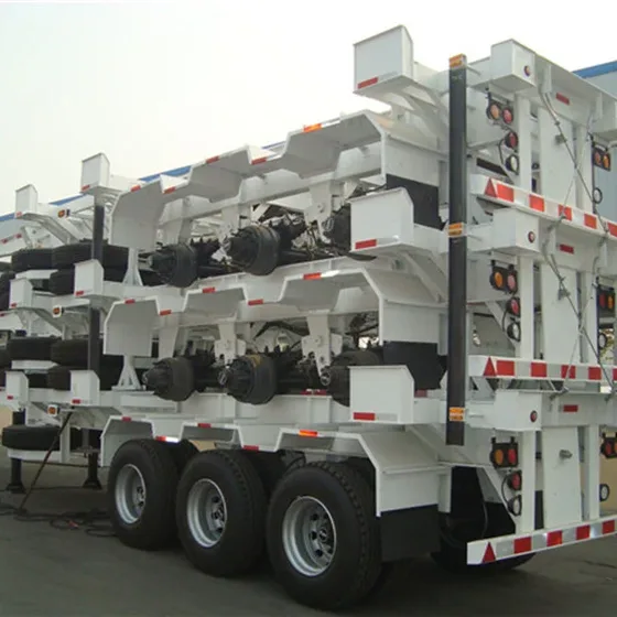 Side view of a 3-axle skeleton semi trailer with 1200R20 tyres and leaf spring suspension