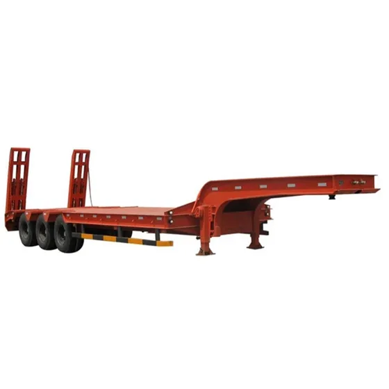 Trailer under load with heavy machinery on the deck, demonstrating low ground clearance