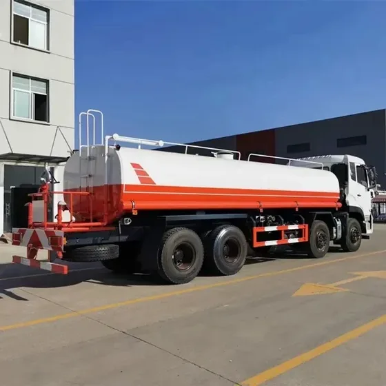 Tanker truck parked at a fuel station