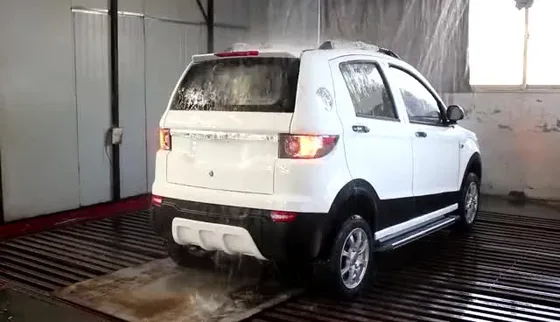 Front three-quarter view of a 4-wheel solar electric vehicle with solar panels on the roof and front grille