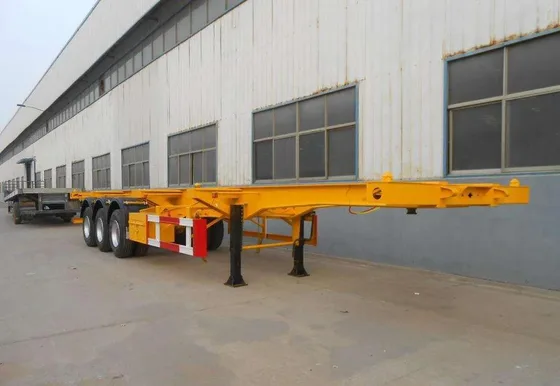 Undercarriage view showing the three 13-ton axles and leaf spring suspension system