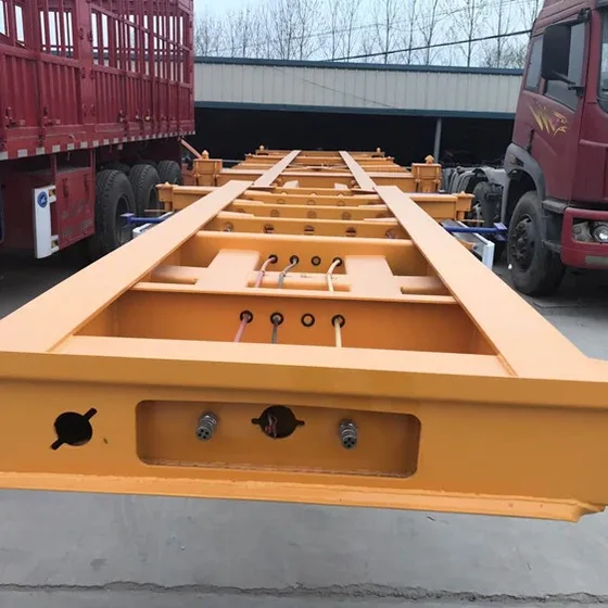 Side view of a 40ft container transport semi trailer with three 13-ton Fuwa axles and leaf spring suspension