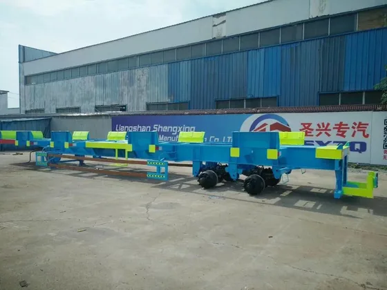 Top-down view of the trailer frame with ISO container corner castings and frame markings