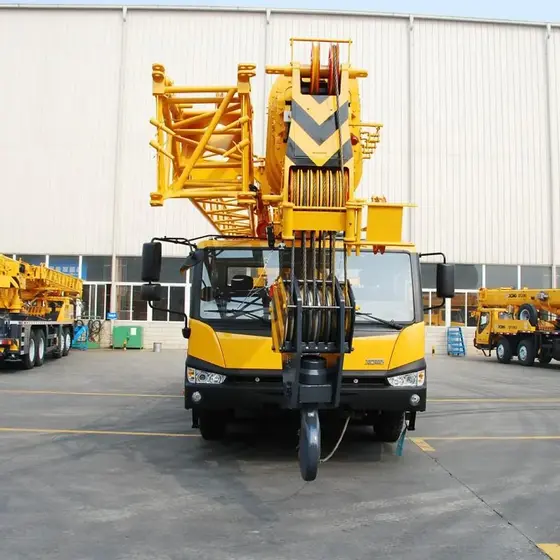 Side view of the XCMG STC500C crane showing the boom and outriggers