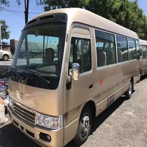 12m pure electric city bus with 17 seats parked on a yard, front three-quarter view