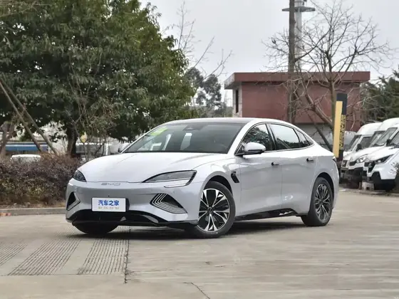 Front three-quarter view of a white BYD E5 electric sedan with LED headlights and 225/50 R18 tyres