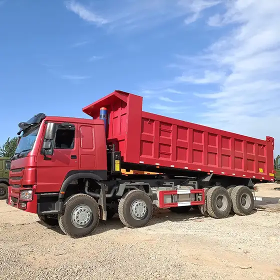 Front three-quarter view of a white Sinotruk HOWO 6x4 dump truck with 12.00R20 tyres and 20 cubic meter tipping box