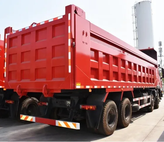 Hydraulic dump bed in raised position with safety locks engaged