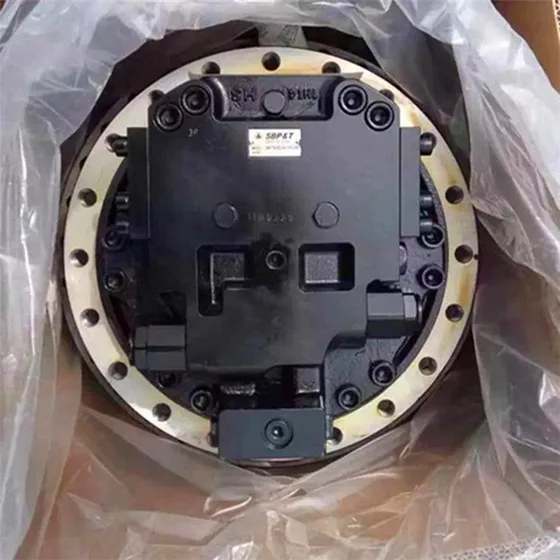 Side view of the TM50 final drive unit with hydraulic ports and shaft end visible