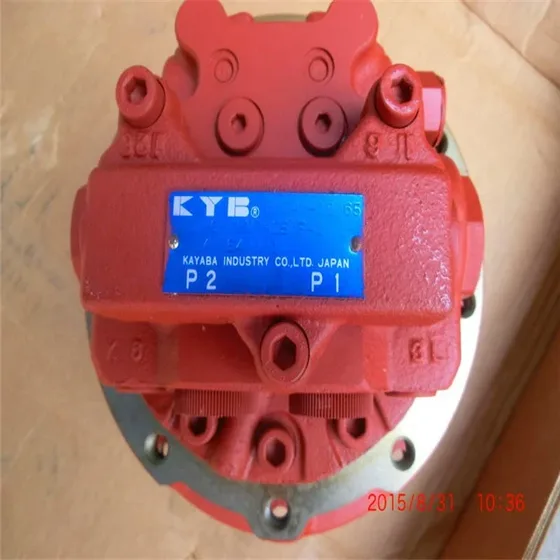 Side view of the final drive with visible gear housing, red paint finish, and shaft end with keyway