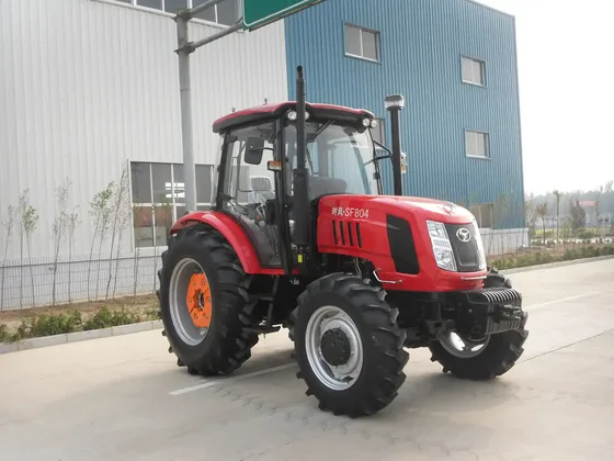 Rear view with PTO shaft, rear wheels, and mud flaps