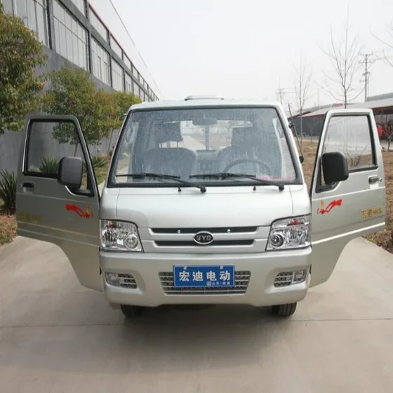 Rear view with rear drum brakes, cargo container, and tail lights