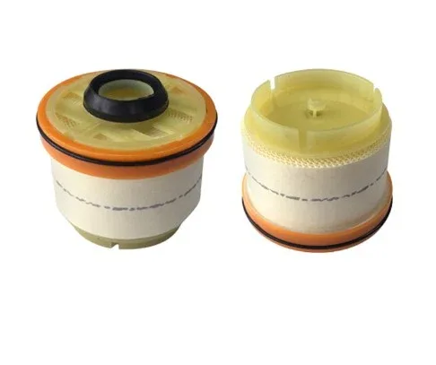 Side view of the fuel filter showing the paper element and end caps, with the OE number 23390-0L010 clearly marked