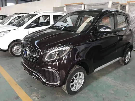 Front three-quarter view of the C200 electric car with solar panel on the roof and front disc brakes