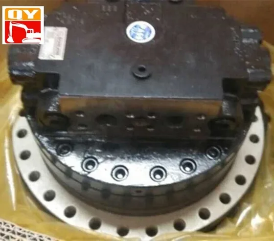 TM40 travel motor and final drive unit mounted on a test rig, showing gear housing and oil ports
