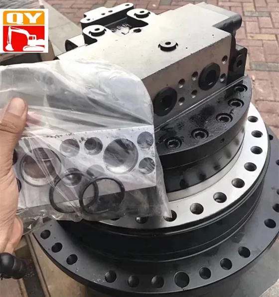 Side view of the TM40 unit with visible gear teeth and mounting flanges