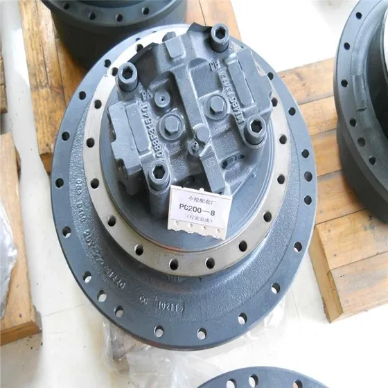 Side view of the hydraulic motor with visible gear housing and mounting bolts