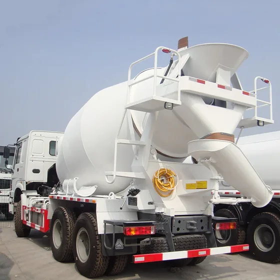 Rear view of the mixer truck with drum discharge mechanism and mud flaps