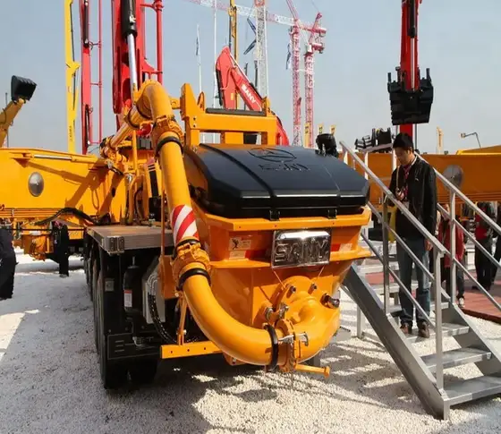 Boom section detail showing the six-stage telescopic arm and joint connections