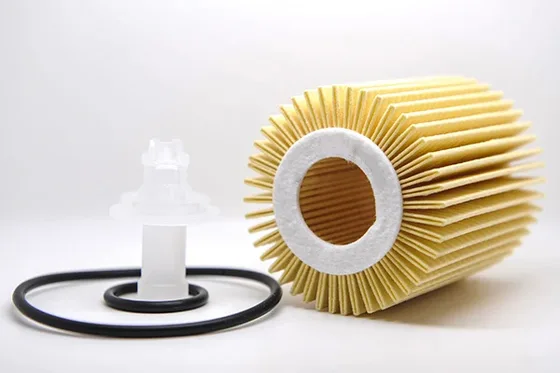 White paper engine oil filter element with OEM number 04152-31030 on a white background
