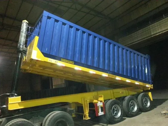 Interior view of the trailer bed with steel Q345B frame and dump gate mechanism