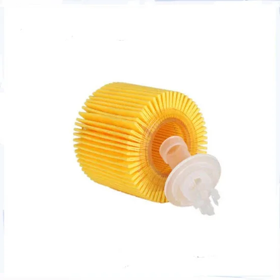 Side view of the oil filter showing the paper media and metal end caps