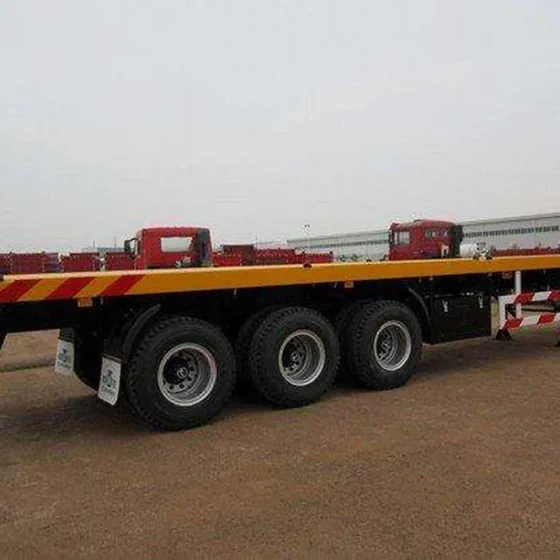 Front view of the trailer with fifth wheel coupling and front axle detail