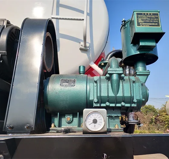 Rear view of the cement trailer showing the discharge valve