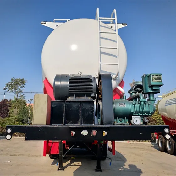 Close-up of the V-shaped tank of the cement trailer