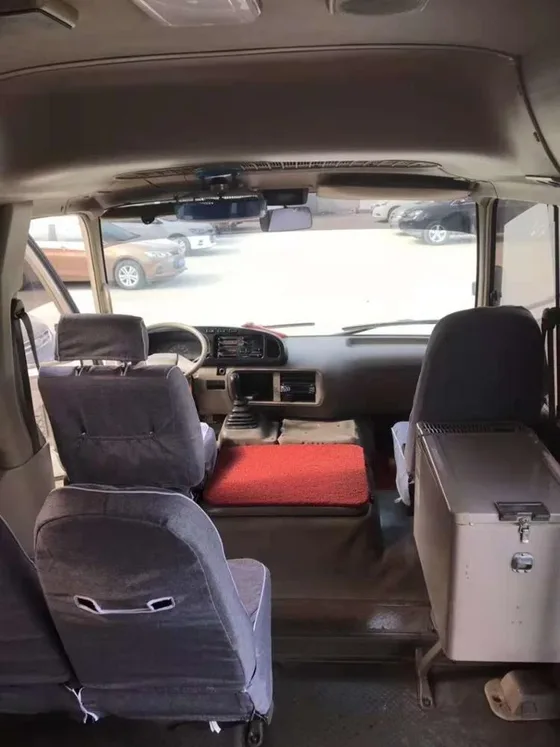 Interior view of the 30-seat cabin with original seats and dashboard