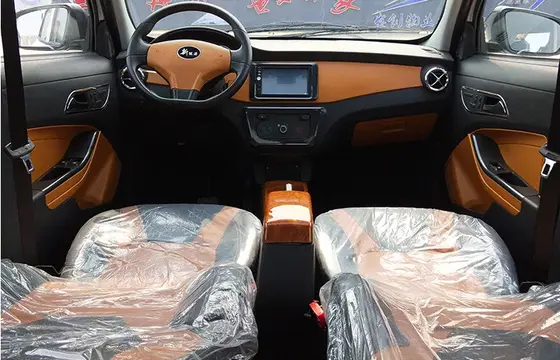 Close-up of the gel battery and smart charger unit under the rear seat